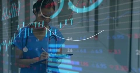 Clinician analyzing data with advanced technology