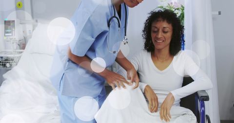 Nurse caring for woman in hospital room healthcare concept
