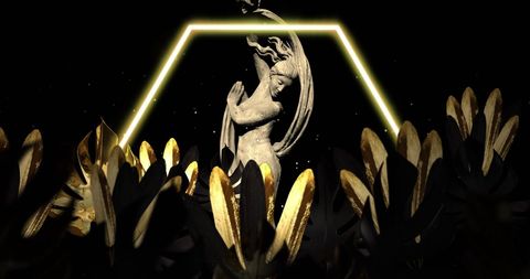 Illuminated stone sculpture with abstract gold leaves