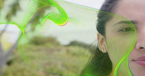 Serene outdoor portrait with abstract green overlay