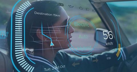 Indian woman driving with augmented reality HUD navigation displaying speed and route