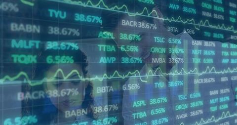 Business professionals analyzing stock data on digital screen