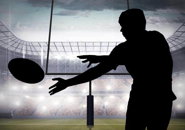 Digital composition of silhouette of player catching a rugby ball in stadium