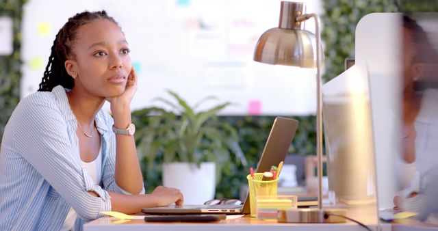 Thoughtful Woman Working at Modern Home Office Desk - Download Free Stock Images Pikwizard.com