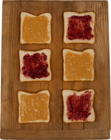 transparent arrangement of peanut butter jam sandwich slices on wooden board - Download Free Stock Videos Pikwizard.com