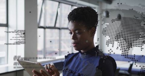 Technology Professional Engaging with Tablet and Digital Interface