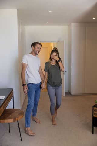 Romantic Couple Entering Modern Minimalistic Apartment
