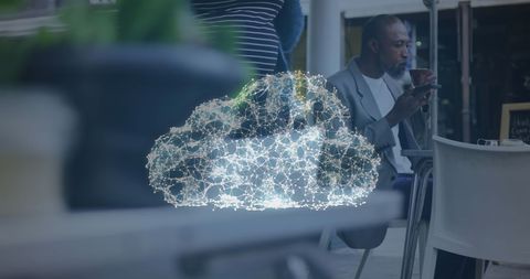 Digital Cloud and Businessman Using Technology in Café