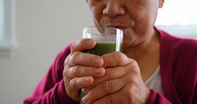 Elderly Woman Drinking Green Vegetable Smoothie - Download Free Stock Images Pikwizard.com