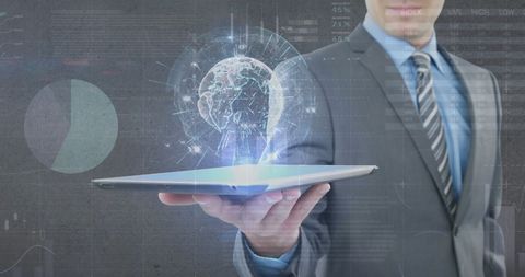 Businessman Holding Tablet with Digital World Projection - Download Free Stock Images Pikwizard.com