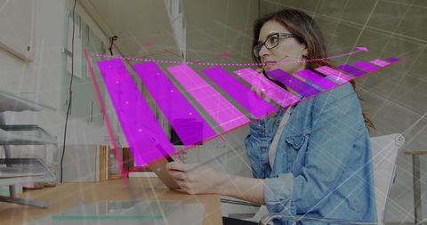 Professional Woman Analyzing Data on Tablet in Modern Workplace