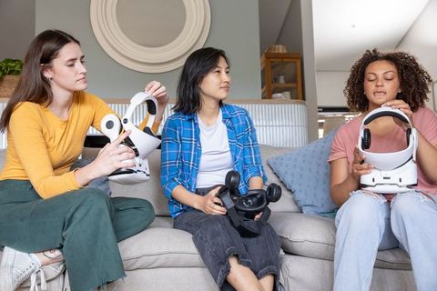 Women Exploring Virtual Reality in Relaxed Home Setting
