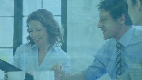 Business Team Collaborating with Digital Interface and Data Analytics