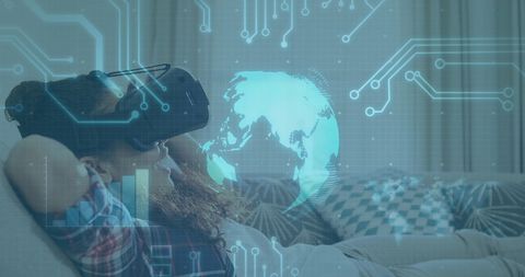 Boy Relaxing at Home Wearing VR Headset with Futuristic Globe Graphics - Download Free Stock Images Pikwizard.com