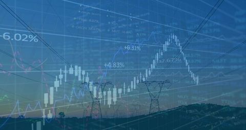 Energy market trends overlaying transmission towers at twilight with candlestick charts