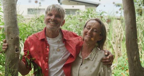 Happy Caucasian Couple Embracing in Nature with Digital Effects