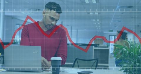 Businessman Analyzing Financial Data Trends in Office - Download Free Stock Images Pikwizard.com