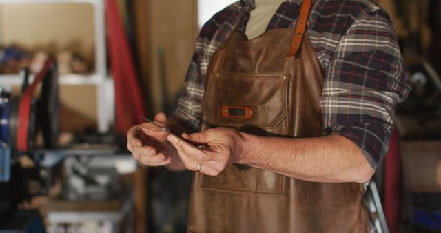 Male Artisan Wearing Apron Crafting in Workshop - Download Free Stock Images Pikwizard.com