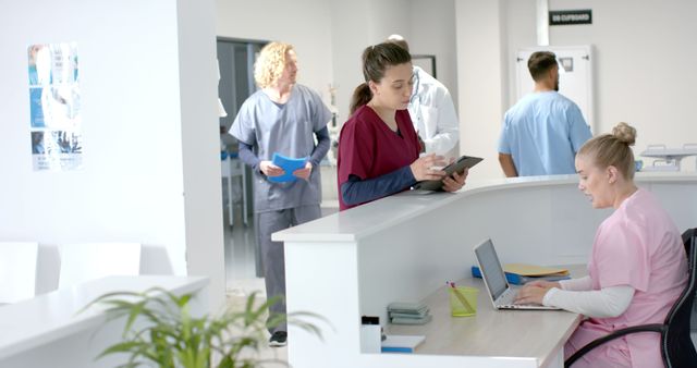 Healthcare Professionals and Receptionist in Modern Hospital - Download Free Stock Images Pikwizard.com