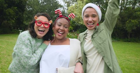 Diverse Friends Celebrating in Yard with Festive Accessories