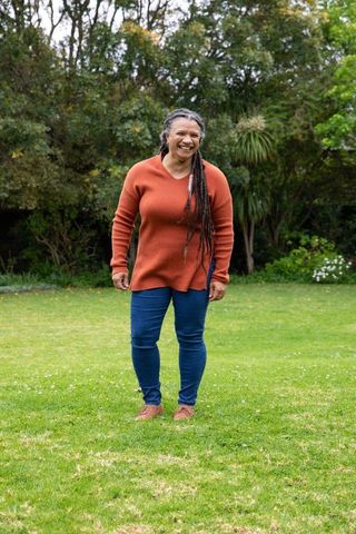 Joyful Senior Woman Enjoying a Peaceful Outdoor Moment