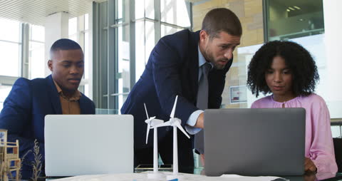 Diverse Business Team Discussing Renewable Energy Project
