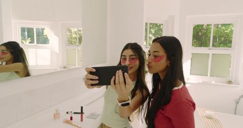 Diverse Women Enjoying Self-Care Taking Mirror Selfie