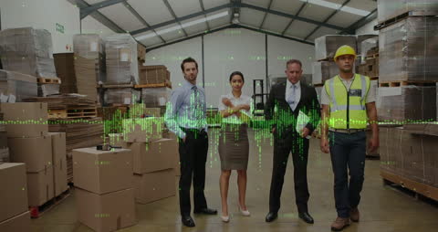 Diverse Warehouse Team with Digital Financial Graphs