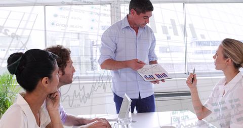 Team Analyzing Financial Data for Strategic Decision-Making - Download Free Stock Images Pikwizard.com