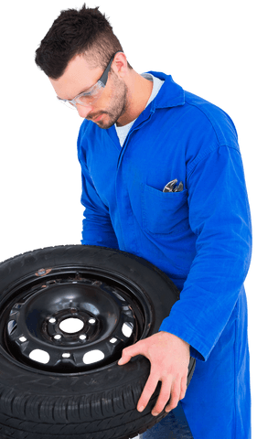 mechanic in blue overall working on car tire transparent - Download Free Stock Videos Pikwizard.com