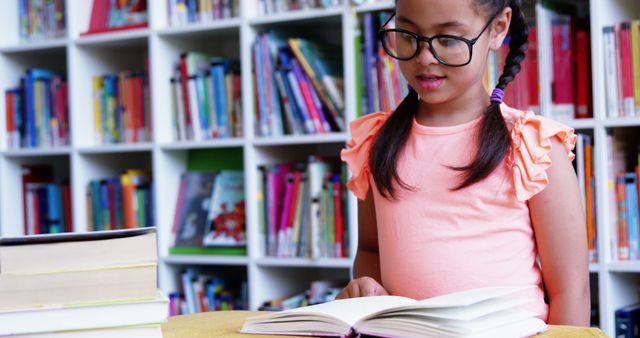 Young Girl Reading in Library - Download Free Stock Images Pikwizard.com