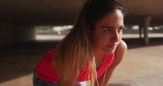 Determined Female Athlete Resting During Outdoor Workout - Download Free Stock Images Pikwizard.com