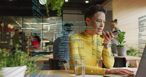 Businesswoman Communicating via Smartphone in Modern Tech Workspace
