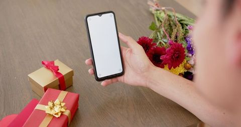 Gift Celebration with Phone Video Call Featuring Blank Screen