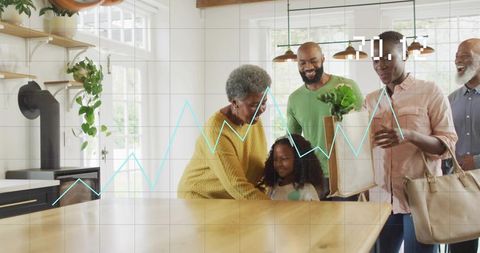 Multigenerational family gathering in sunny kitchen leaning on island with groceries