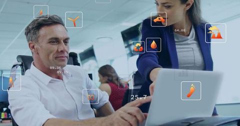 Business Team Discussing Renewable Energy Solutions on Laptop