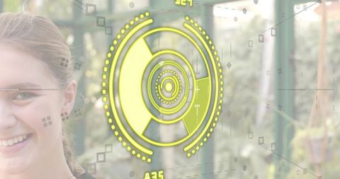 Smiling woman wearing neon-yellow ar hud with facial tracking markers inside greenhouse
