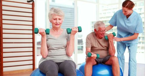 Senior Citizens Exercising with Physiotherapist in Rehab Center - Download Free Stock Images Pikwizard.com