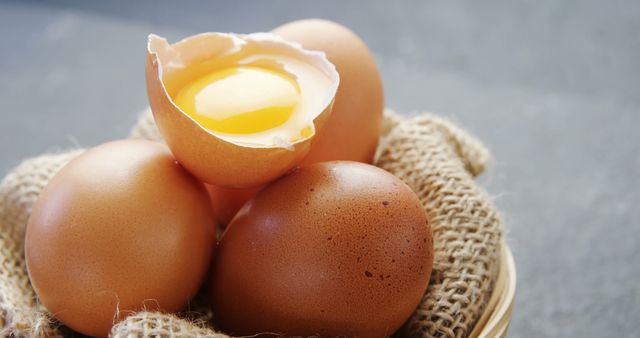 Close-Up of Fresh Brown Eggs in Burlap with One Cracked - Download Free Stock Images Pikwizard.com