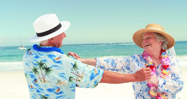Joyful elder couple dancing hand in hand on scenic tropical beach, wearing floral leis and bright Hawaiian shirts. Perfect for illustrating stories of happiness in retirement, vacation themes, beach life, and senior romance.