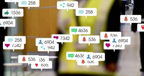 Social media notification overload surrounding commuter in transit hub with floating icons