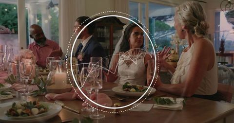 Bride Listening at Candlelit Wedding Reception, Elegant Wooden Table, Pink Floral Decor