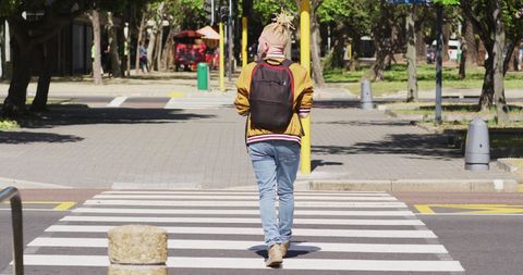 Albino Man with Dreadlocks Crossing City Street - Download Free Stock Images Pikwizard.com