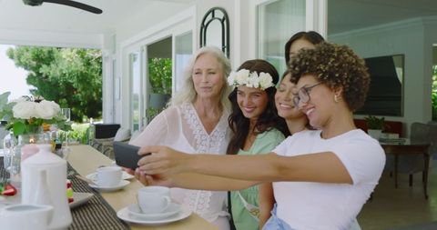 Women Celebrating Wedding Enjoy Selfie at Home Smiling Together