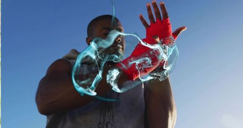 Determined Athlete Wrapping Hands with Futuristic Swirling Energy