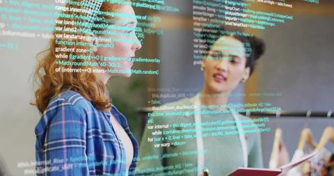Two Professionals Collaborating on Coding Project in Modern Office