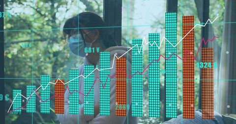 Young girl wearing surgical mask and glasses viewing financial data overlay on window