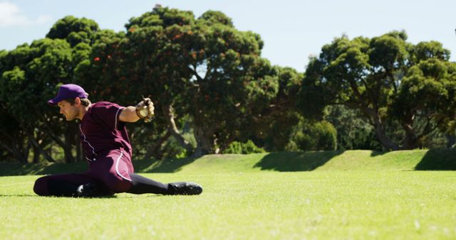 Baseball Player Sliding on Grass Field During Game - Download Free Stock Images Pikwizard.com