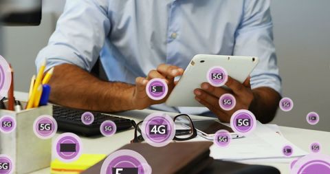 Businessman Using Tablet with 5G Technology Concept Overlay