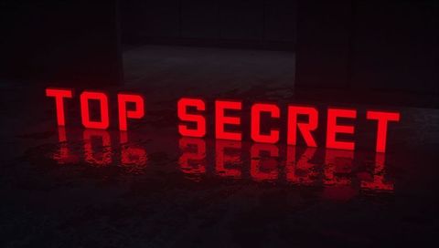 Glowing top secret neon letters reflecting on wet concrete floor in industrial warehouse